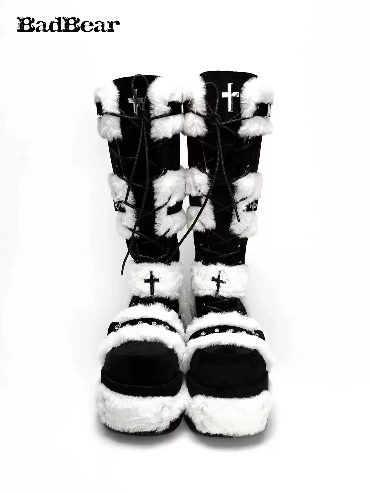 Black and white platform boots with crosses and faux fur, featuring a goth and punk style